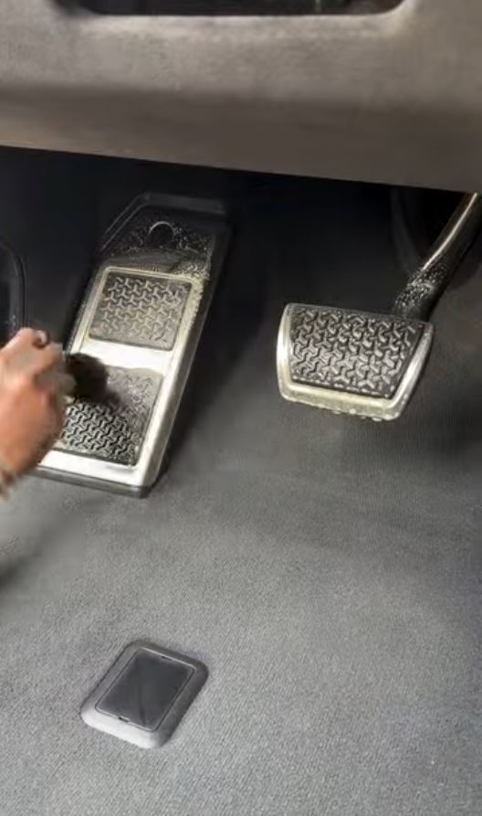Interior pedal detailing by Wiper Car Wash